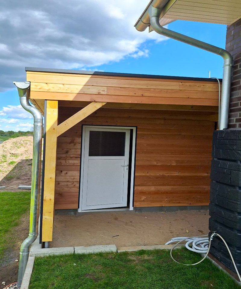 Moderner Holzbau mit Flachdach in Rendsburg – Zimmerei Rendsburg